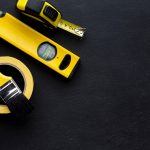 arrangement-yellow-tools-flat-lay-with-copy-space_23-2148393107