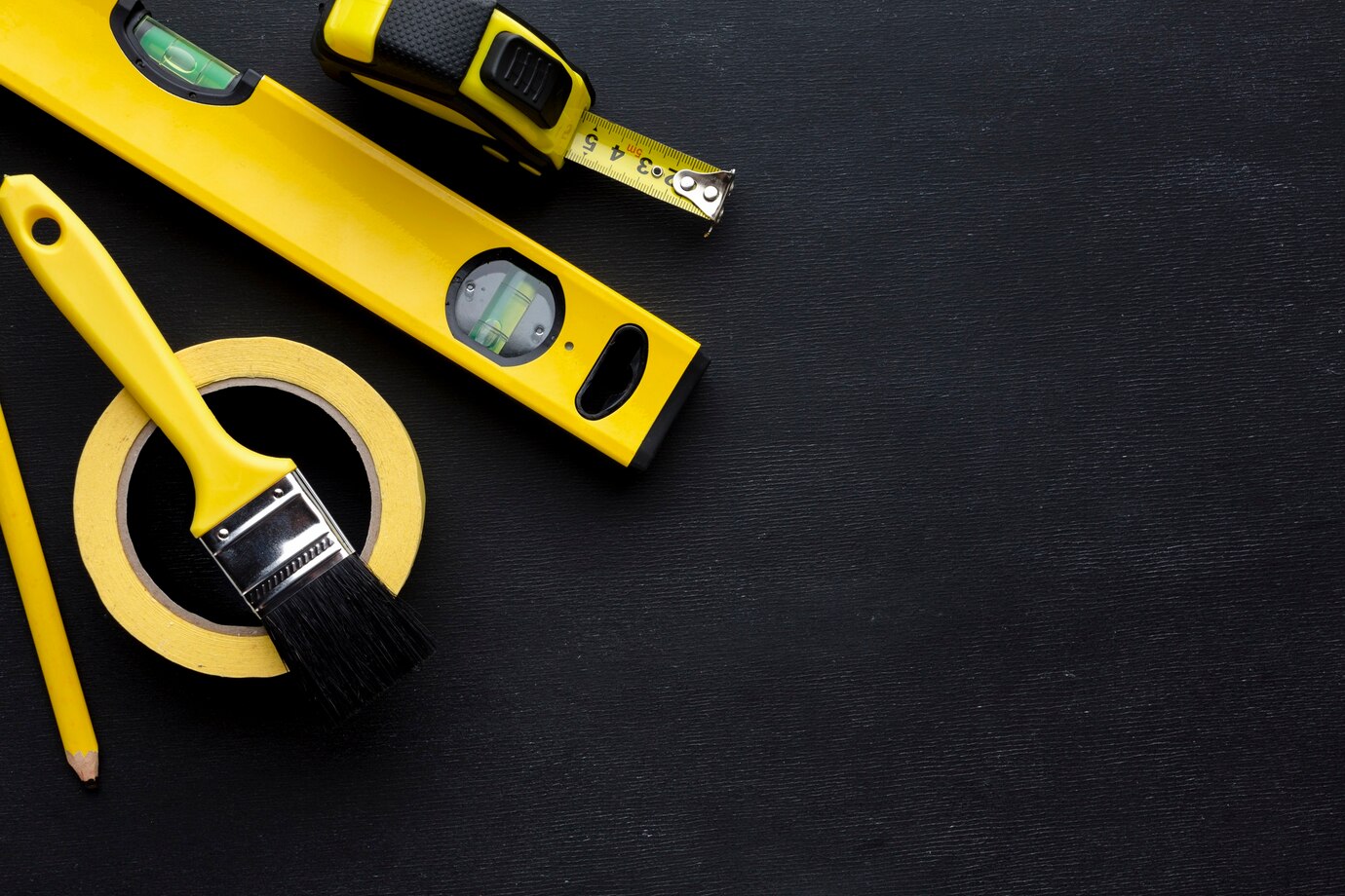 arrangement-yellow-tools-flat-lay-with-copy-space_23-2148393107