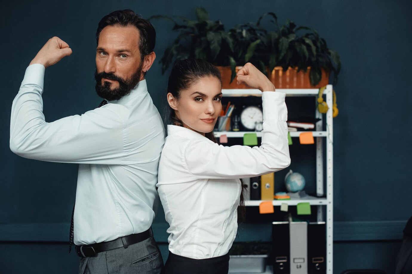 half-length-image-business-colleagues-showing-muscles-camera-fight-genders-concept_549566-657